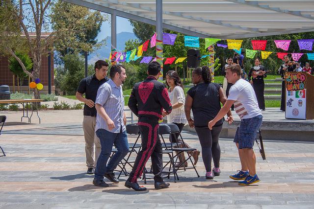 DVC students participating on a game of musical chairs at the Cinco de Mayo event at the DVC common area on May 6, 2015