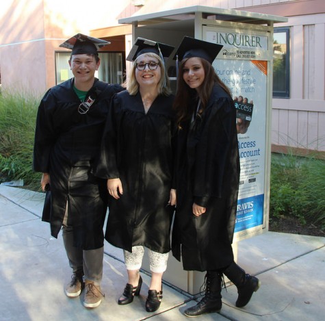 Inquirer editors in graduation gear.