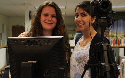 Deven Meadows and Pariya Farzami, working the main desk in the Library, would be happy to issue you a student ID.