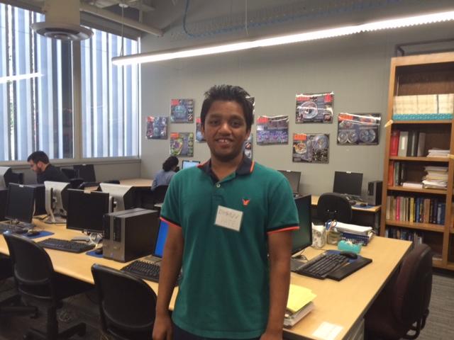 Dhruv Patel, a molecular cell biology major, tutors micro biology students at the Biology and Health Sciences Tutoring Center. 