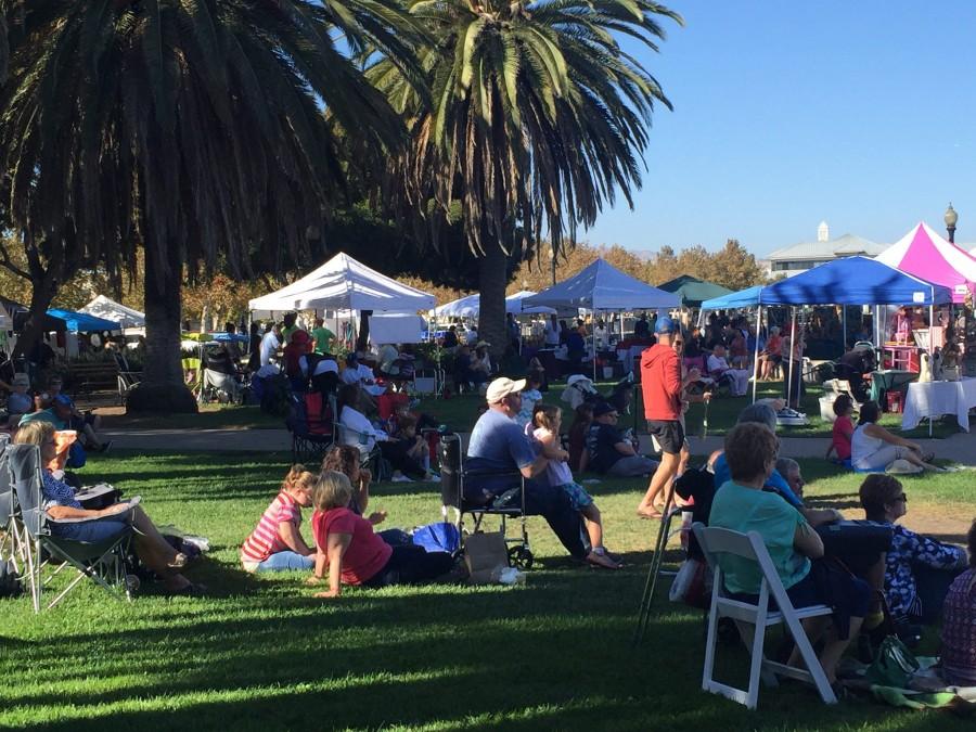 People gather to watch live entertainment at the 11th annual Art, Wine and Chocolate Festival at Suisun Citys Historic Waterfront.