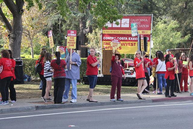 Nurses from the Martinez County Hospital strike in front of the hospital entrance on Wednesday  7.