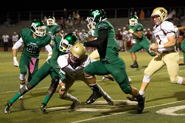 DVC wide receiver Dimitri Salido (22) maneuvers his way around the De Anza defense in a game between DVC and De Anza at DVC in Pleasant Hill, Calif. on Friday, Oct. 16, 2015. The Vikings won 33-0