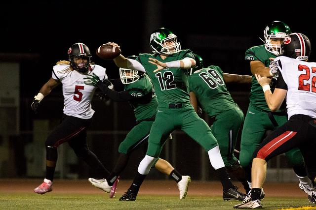 DVC quarterback Drew Anderson (12) throws a pass in a game between DVC and Foothill College at DVC in Pleasant Hill, Calif. on Friday, Oct. 23, 2015. The Vikings won 52-13.