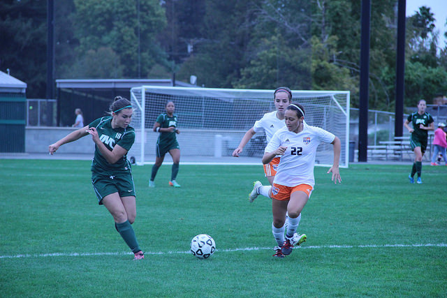 DVC forward Julia Curran (18) taking the ball down the field in a game between DVC and Consumnes River at DVC in Pleasant Hill, Calif. on Tuesday, Oct. 27, 2015. The Vikings won 7-0.