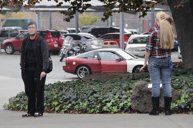 Students enjoy a smoke break in the designated parking lot on DVC campus in Pleasant Hill, Dec. 7.