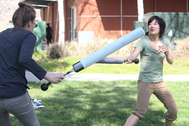 Two students live action role-playing outside near the Diablo Valley College mathematics building , Feb. 26. 