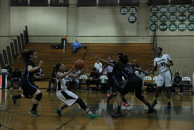 #43 Safiyyah Yasin tries to make a pass through traffic in DVCs playoff game against CCC on Feb. 25.