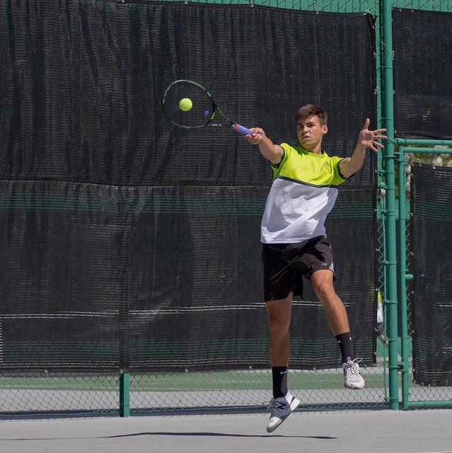 Garrett Goldman, Freshman for Diablo Valley College, strikes back in his singles match against America River City College, Saturday March 26.