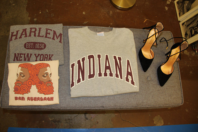 Pointed lace up heel, graphic t shirts and university apparel at Goodwill in Pleasant Hill 