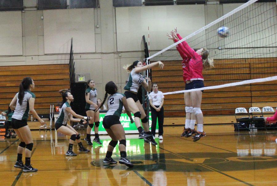 Middle Hitter, Ashley Dixon, scores against Cosumnes River College giving DVC a 9-2 lead in set 3 on Oct 21.