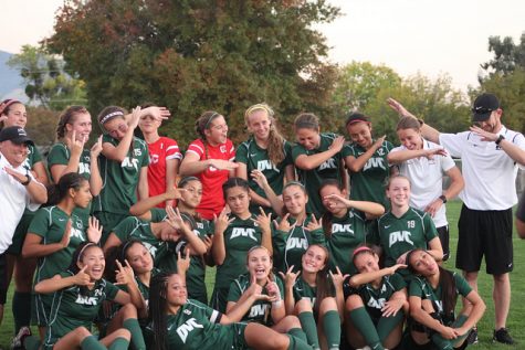 2016 women's soccer team take a silly photo after their 3-0 victory and celebrate the end of their regular season.