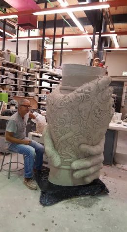 Mark Messenger adds clay into his Cliffhanger sculpture Nov 1, 2016