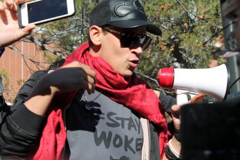 Milo Yiannopoulos speaks with a crowd of supporters during a peaceful protest on the UC Davis campus on January 14, 2017.