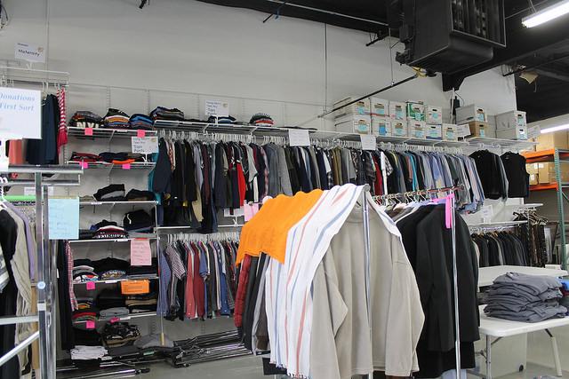 Clothes hang in the White Pony Express free general store.