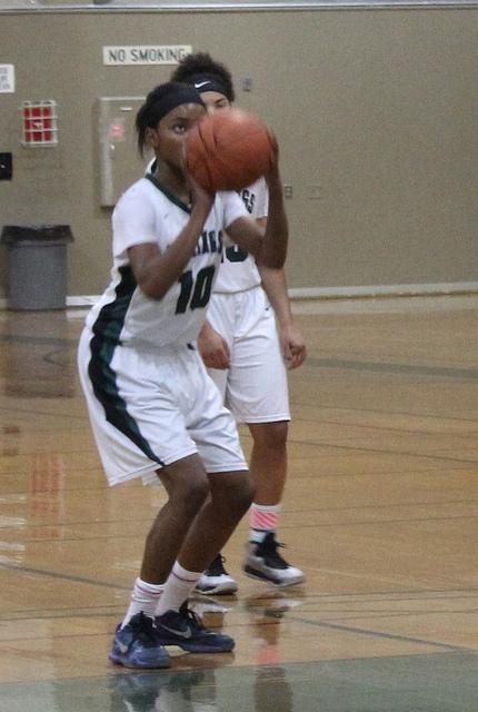 Doris Jones shoots a free throw in the last quarter of the final home game of the season against Sacramento City College on Feb. 10.