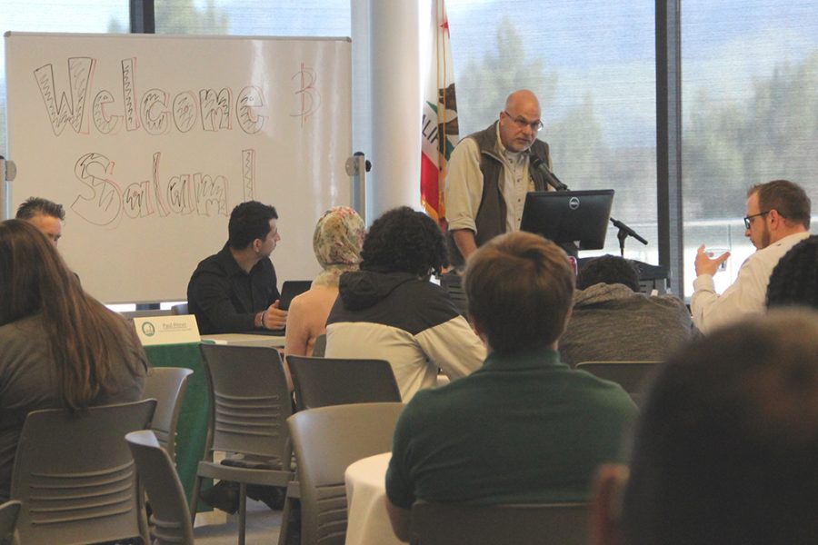 John Kropf, retired sergeant of US Army intelligence, addresses the crowd on February 28, 2017.