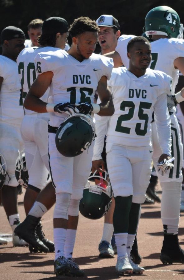 Wide receivers Brandon Perrilliat (left) and DMaurier McKenzie (right) head back to the sideline after their drive ends in a punt during a game against City College in San Francisco, California on October 14, 2017.