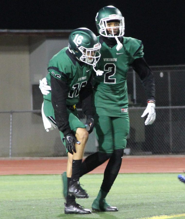 Wide receivers Brandon Perrilliat (left) and Antwuin Prowes (right) walk back to the sideline in their game against College of San Mateo at Diablo Valley College in Pleasant Hill, California on November 10, 2017.
