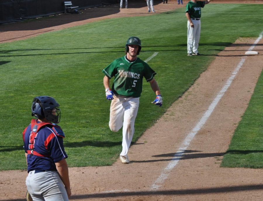 Michael Theisen (5) scores easily on a Logan Nonies single as part of a five-run seventh inning against Santa Rosa Junior College in Pleasant Hill on March 29, 2018.