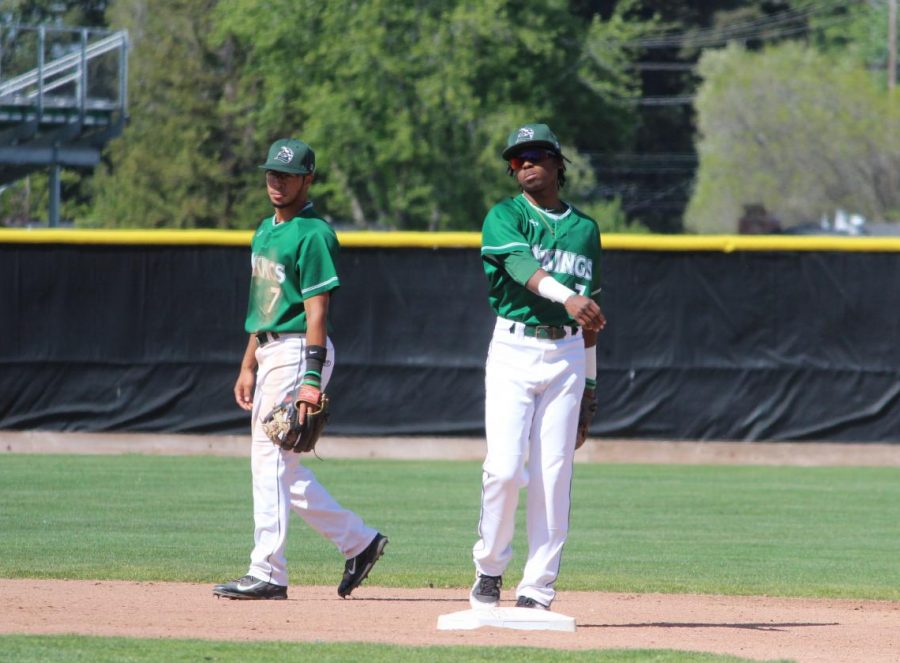 Shortstop Jordan Williams (left) and second baseman Isaq Lewis (right) in a game against San Joaquin Delta College in Pleasant Hill on April 27, 2018.