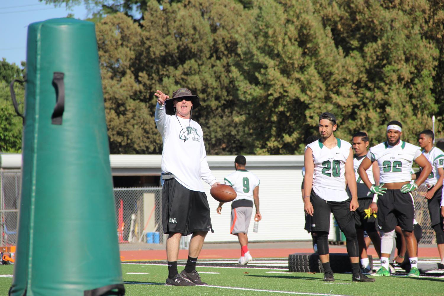 DVC head coach Mike Darr giving instructions before a drill during a spring practice on May 17, 2018.