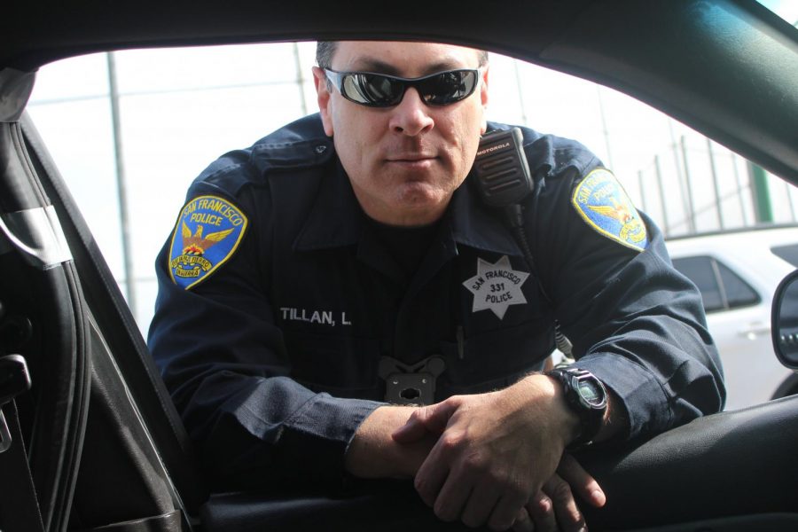 San Francisco Police Department Officer Luis Tillan wears the holder for his body camera in the center of his chest, a new tool brought on by the police reform.
