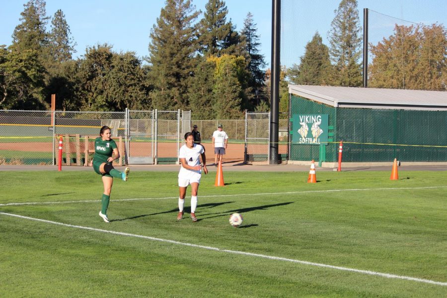 Brie Eaton clearing the ball on the defensive end against Santa Rosa at DVC on Nov 6,2018.(George Elias/DVC inquirer)