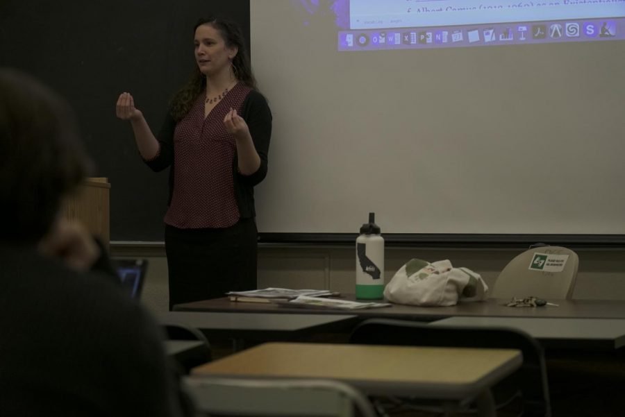 Professor Rayshell Clapper instructs her short story writing course in the humanities building. 