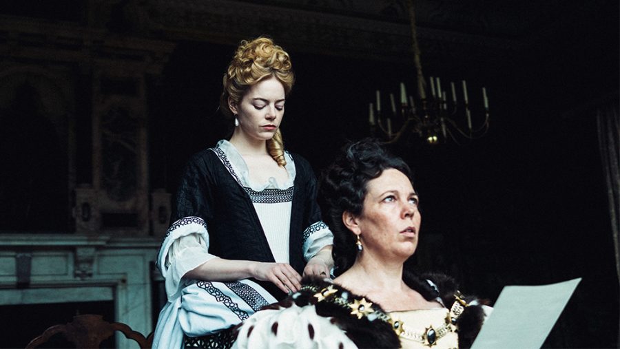 Abigail (Emma Stone) and Queen Anne (Olivia Colman) in Yorgos Lanthimos The Favourite. 