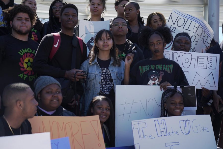 Students of color and others gathered yesterday during a walkout, to voice the lack of communication from president Susan Lamb--regarding racial slurs and a lynching illustration, found in the Engineering and Technology building. 
From left to right starting at the top: Brenda Ortiz, Ohemaa Asare, Halea Monigan, Tre Stone, Sadé Creel. 2nd row: Juwan Roquemore, Sam, Vanessa Galang, Bishari Taylor, Kiana Stewart, Haley Hall. 3rd row, at the bottom: Lee West, Daechelle Harper, J’Dah Christian and
Sam Kanyika (Ethan Anderson/The Inquirer)