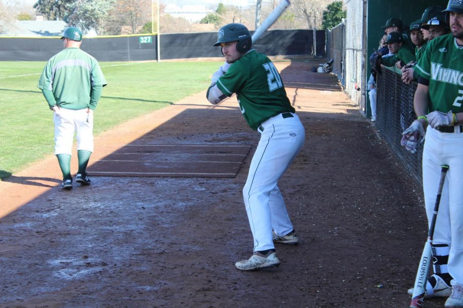 First basemen Dante Peretti taking swings in the on deck circle in the game against Cabrillo on Feb. 19, 2019. The Vikings lost 9-7. (Alex Martin/The Inquirer)