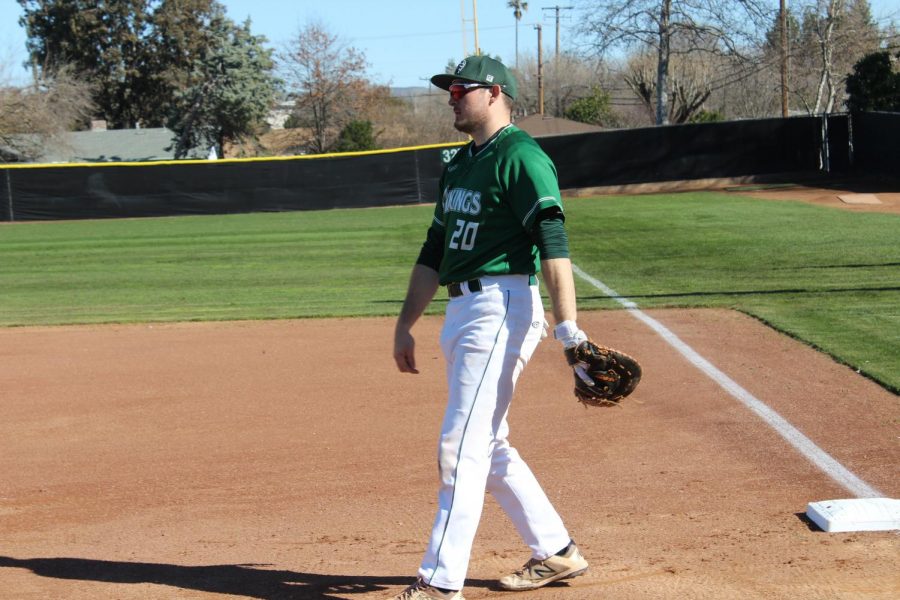 First basemen Dante Peretti warms up in the home matchup against Cabrillo on Feb. 19, 2019. The Vikings lost 9-7. (Alex Martin/The Inquirer)