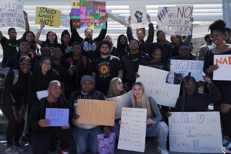 On March 13, students of color and others gathered for a photo shoot after the walkout. (Ethan Anderson/The Inquirer)