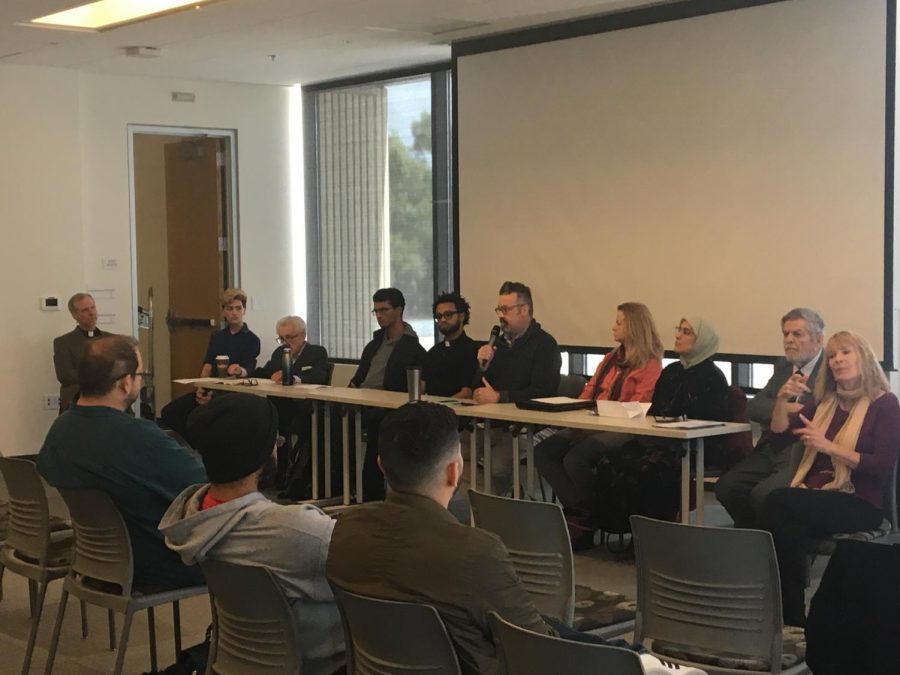 Reverend Will McGarvey speaks in front of students, panelists and faculty in the Diablo Room on March 20, 2019. (Gavin Rock/ Inquirer)