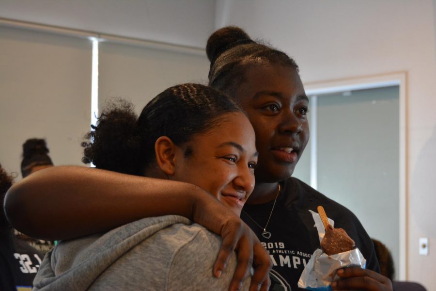 Sierra Smith (left) and Zahria Hendrix (right) celebrate their state championship victory with members of DVC in the Business/Foreign Language building on April 16, 2019. (Samantha Laurey/Inquirer)