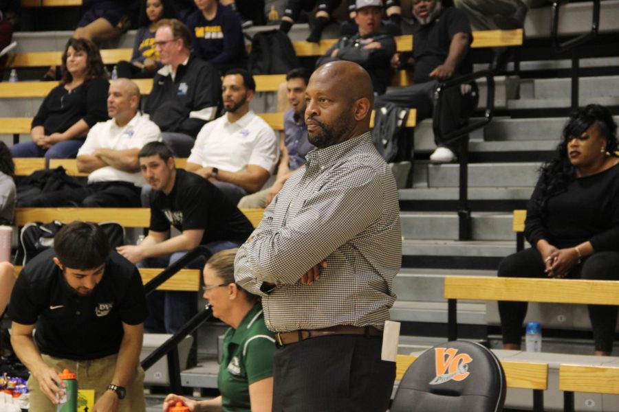 Coach Ramaundo Vaughn diligently watching his players during the Semi-Finals championship. (Alex Martin/The Inquirer).