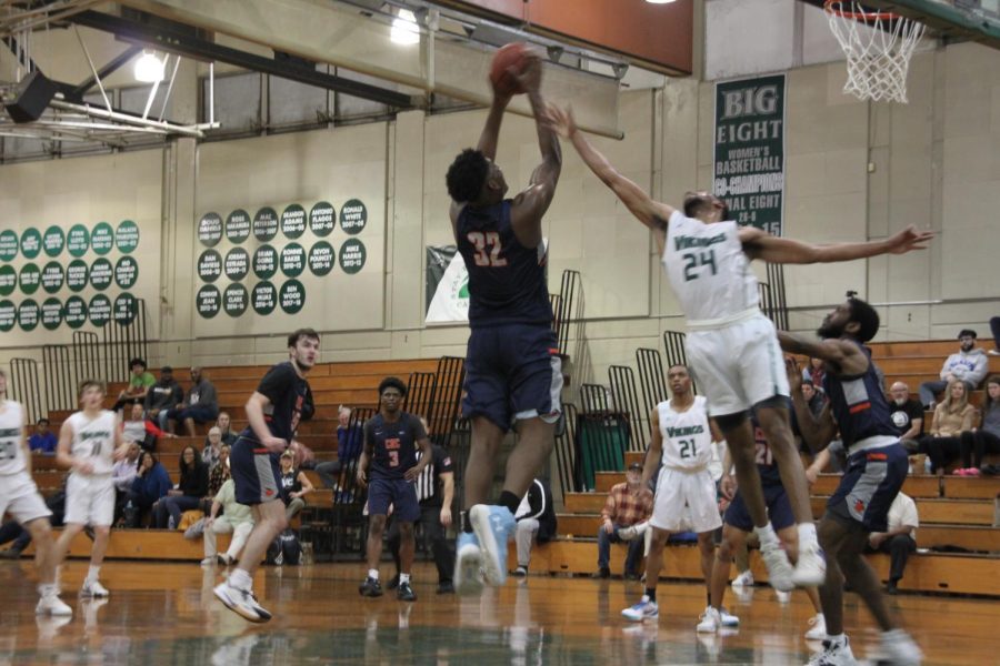 Isaih Hood, power forward, blocks a Cosumnes player (Anthony Perry/The Inquirer).