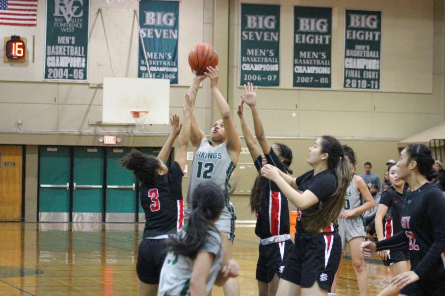 Yanira Gabourel taking a shot. (Anthony Perry/The Inquirer)