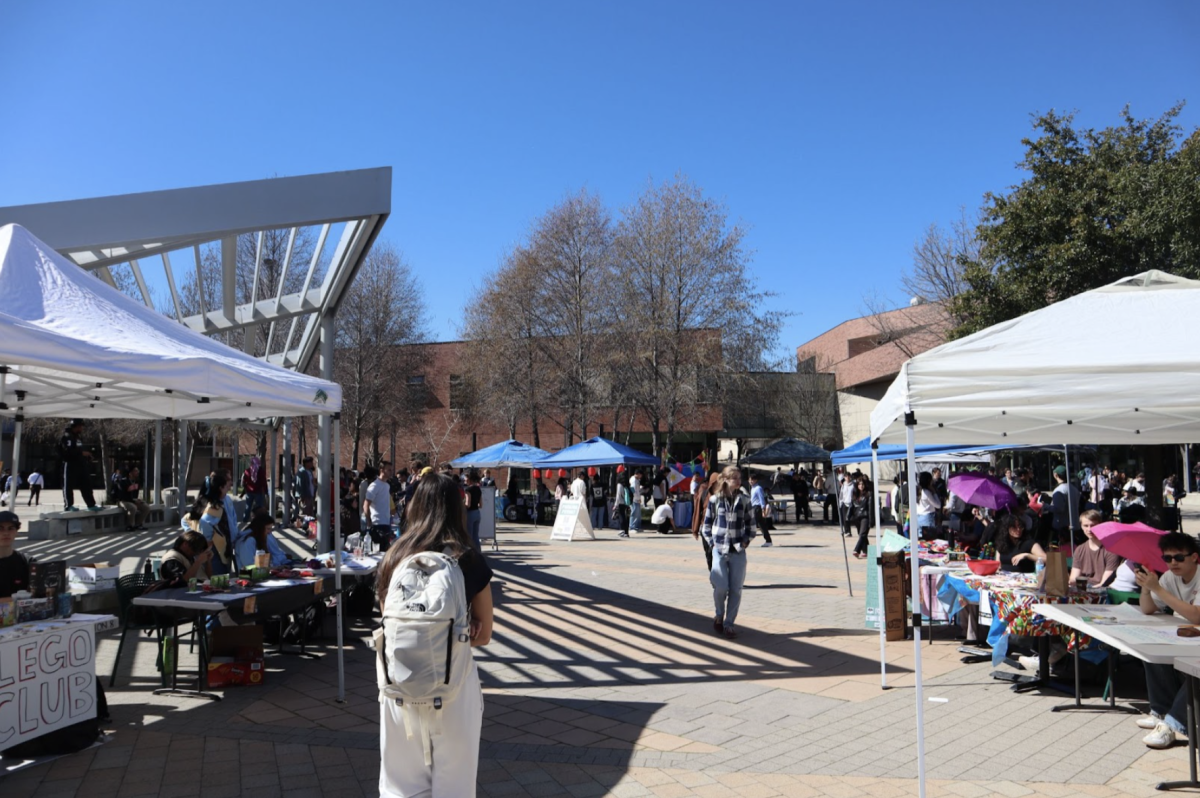 DVC Commons, filled with booths and students for club day.