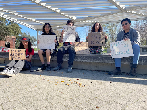 Thomas Simbulan (far right) joined the demonstration organized by Cameron Kuehn (second from right) to raise awareness about Mahmoud Khalil and defend the right to protest.